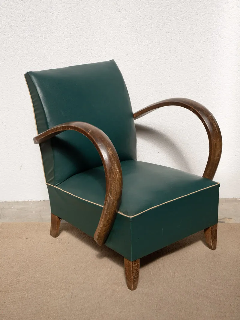Jakob, le fauteuil en bois et skaï vert N°1305