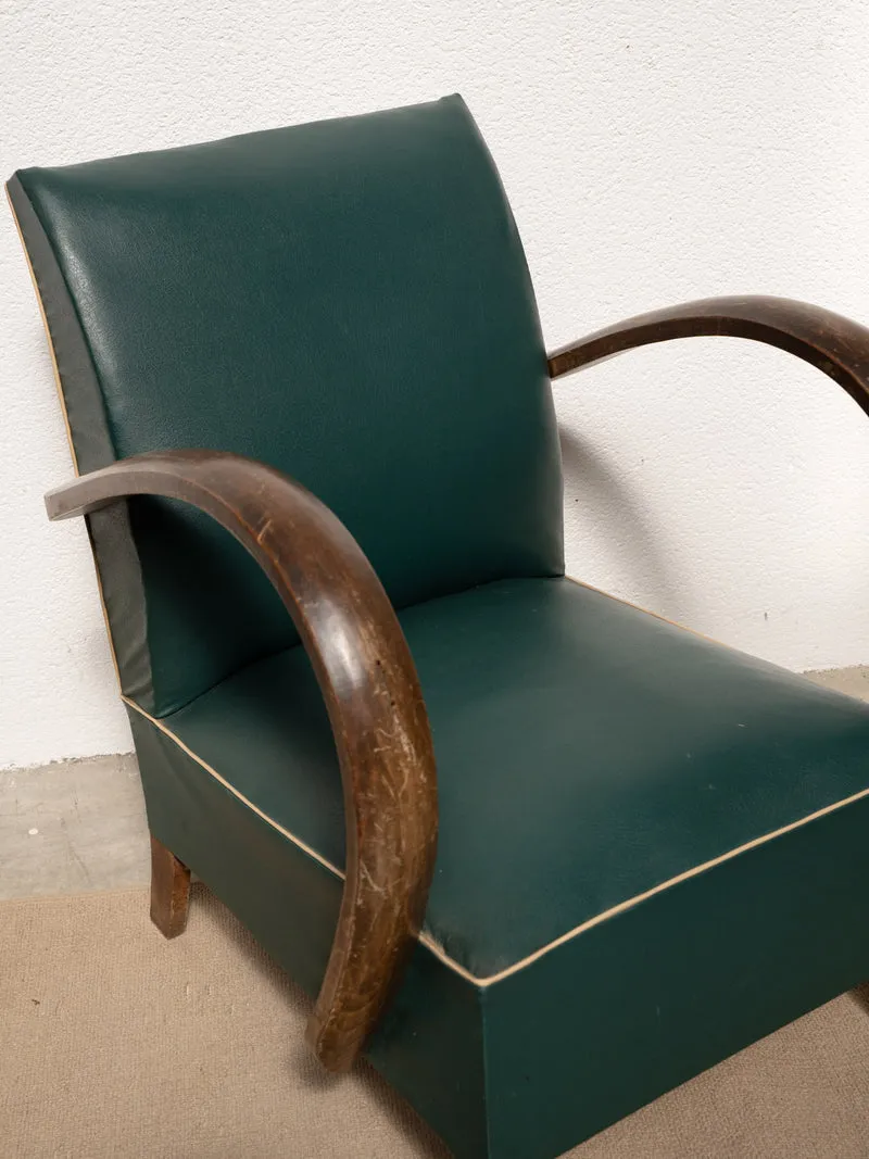 Jakob, le fauteuil en bois et skaï vert N°1305