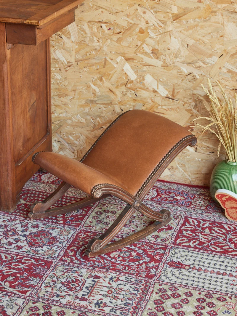 Regis, le tabouret repose pieds en cuir N°1363