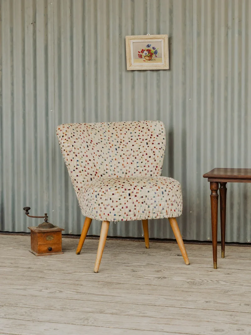 Jakob, le fauteuil en tissu beige coloré N°1207