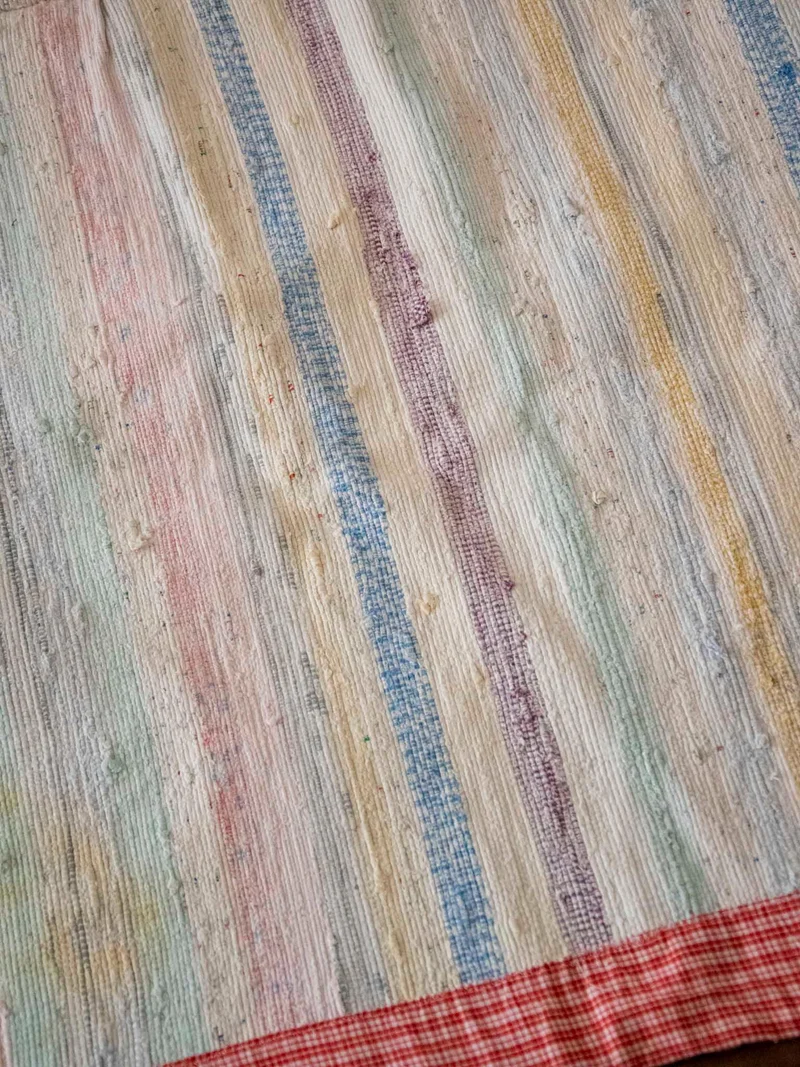 Olivier, le tapis au rebord à carreaux N°115