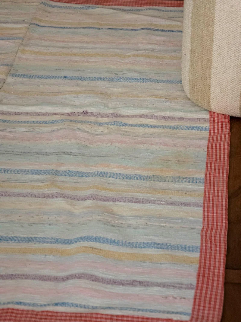 Olivier, le tapis au rebord à carreaux N°115
