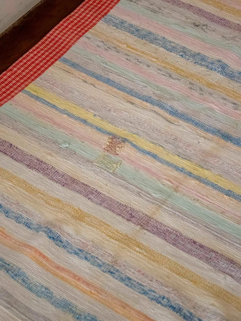 Olivier, le tapis au rebord à carreaux N°115