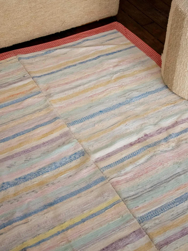 Olivier, le tapis au rebord à carreaux N°115