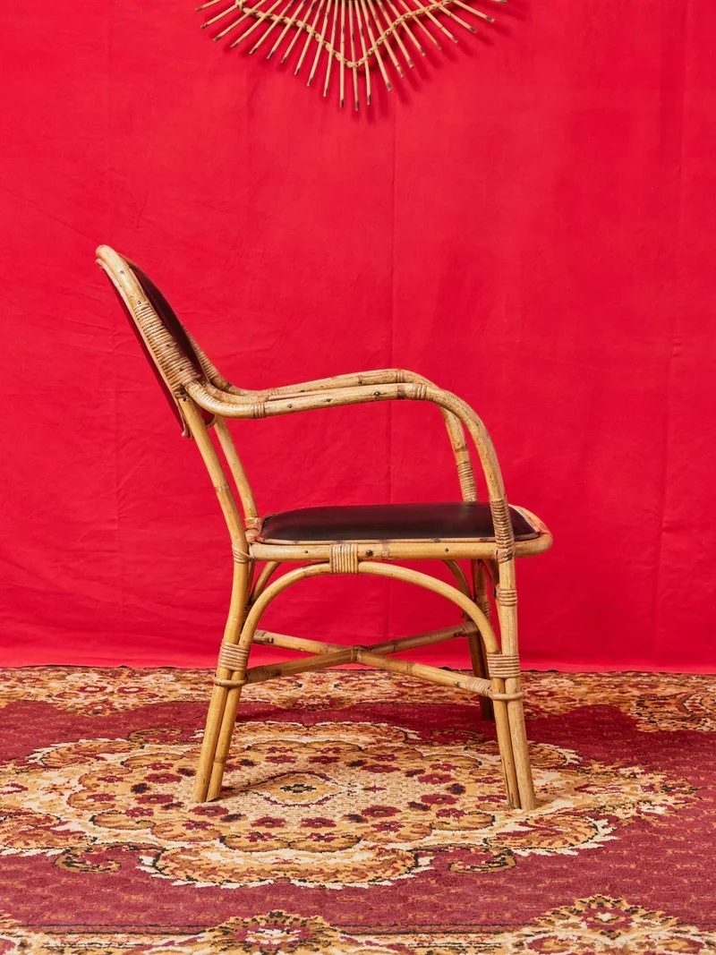 Ernest, la paire de fauteuils en osier et cuir N°711