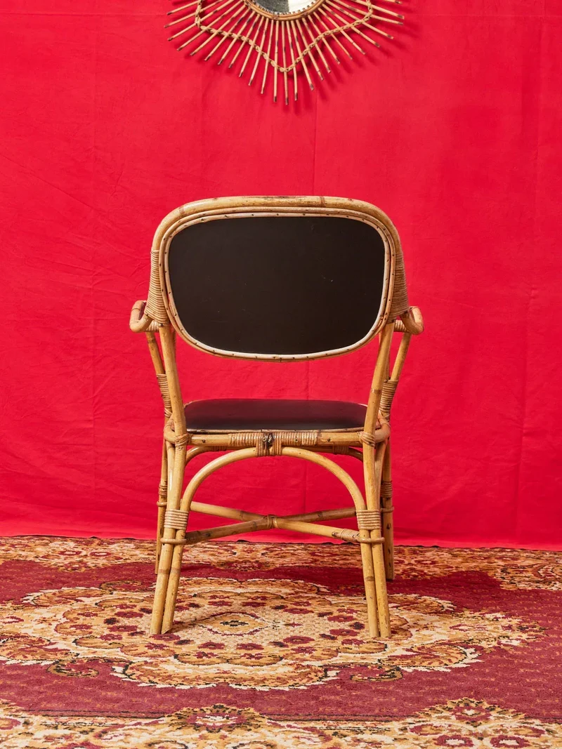 Ernest, la paire de fauteuils en osier et cuir N°711