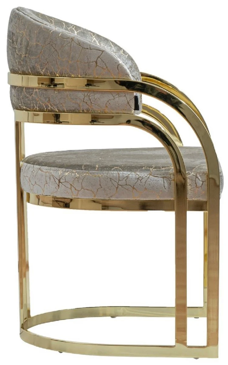Casa Padrino Luxus Esszimmer Stuhl mit Armlehnen Silber / Gold H. 88 cm