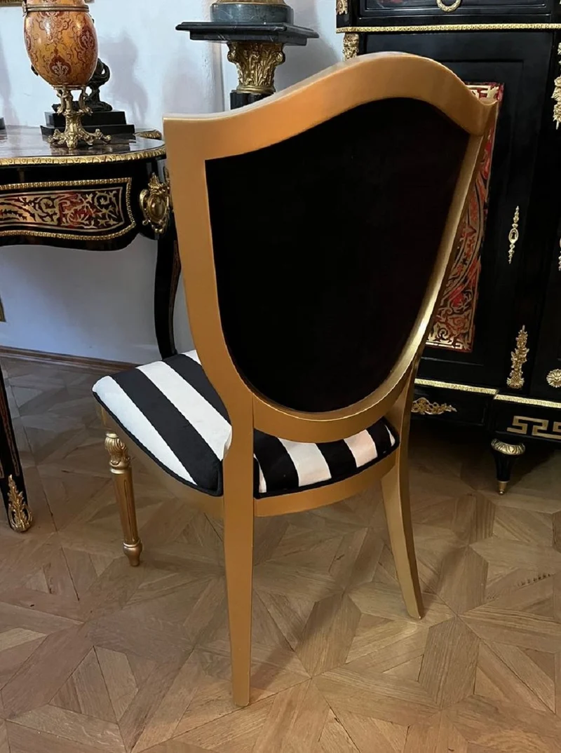 Casa Padrino Art Deco Esszimmer Stuhl Schwarz / Weiß / Mehrfarbig / Gold - Art Deco Massivholz Stuhl - Art Deco Esszimmermöbel - Art Deco Möbel - Art Deco Einrichtung - Möbel im Art Deco Stil