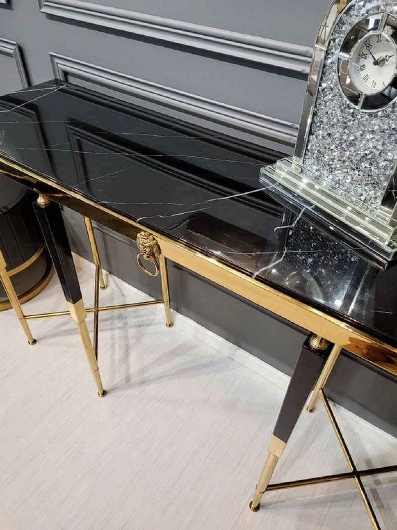 Casa Padrino Luxus Konsole Schwarz / Gold 140 x 40 x H. 85 cm - Rechteckiger Konsolentisch mit Kunstmarmor Tischplatte - Wohnzimmer Möbel - Luxus Möbel - Luxus Einrichtung