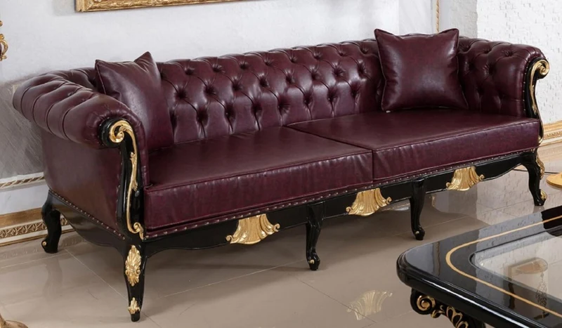 Casa Padrino Luxus Barock Chesterfield Leder Sofa Bordeauxrot / Schwarz / Gold - Prunkvolles Wohnzimmer Echtleder Sofa - Barock Chesterfield Leder Möbel - Luxus Möbel im Barockstil