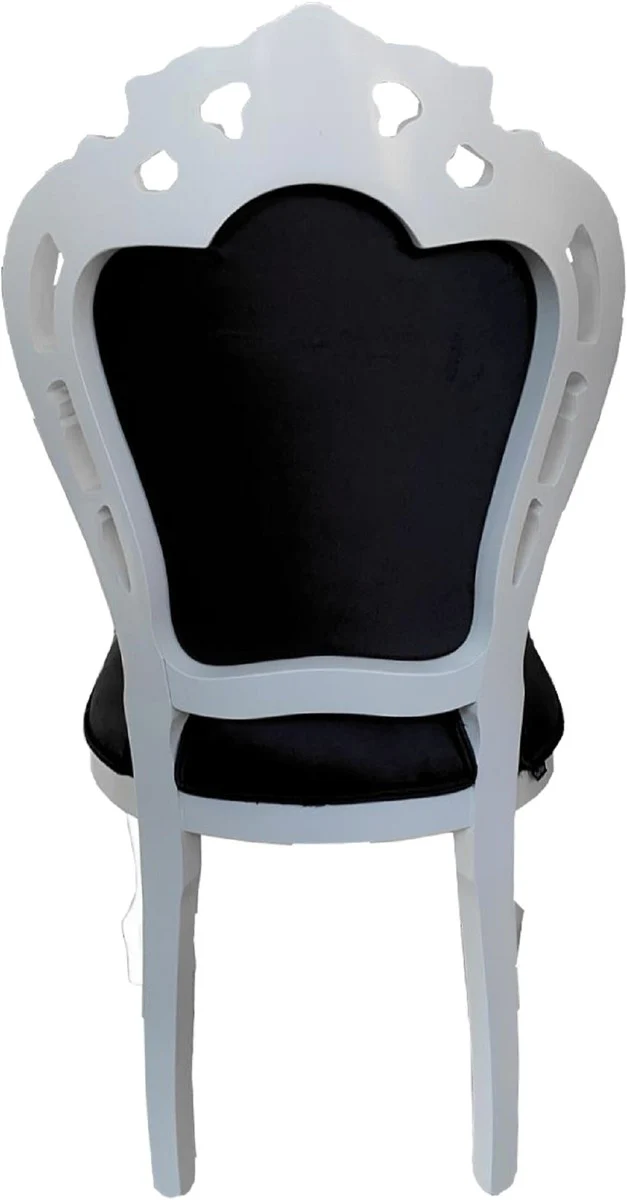 Casa Padrino Luxus Barock Esszimmerstuhl Schwarz / Weiß - Handgefertigter Massivholz Stuhl mit edlem Samtstoff - Barockstil Küchenstuhl - Barock Esszimmer Möbel