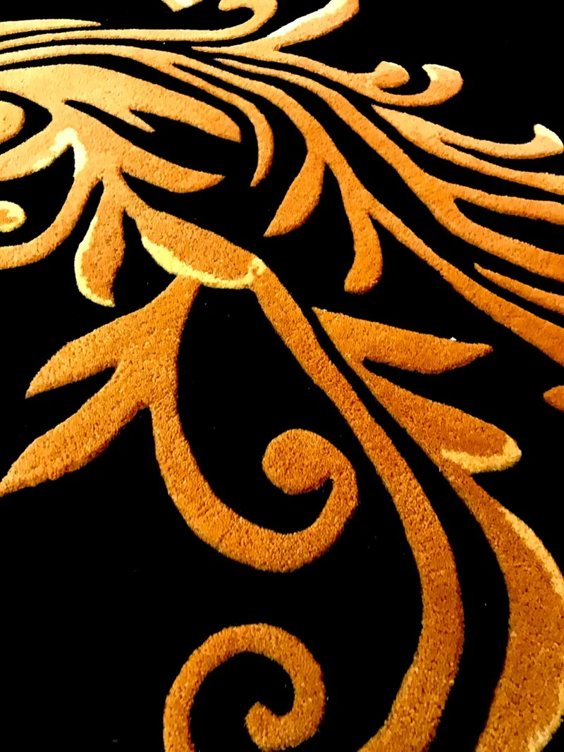 Pompöös by Casa Padrino Luxus Teppich von Harald Glööckler 120 x 170 cm Krone Schwarz / Gold - Barock Design Teppich - Handgewebt aus Wolle
