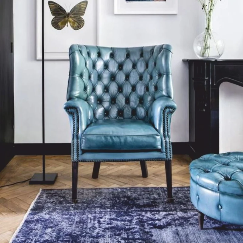 Casa Padrino Luxus Chesterfield Echtleder Ohrensessel Hellblau / Schwarz H. 112 cm