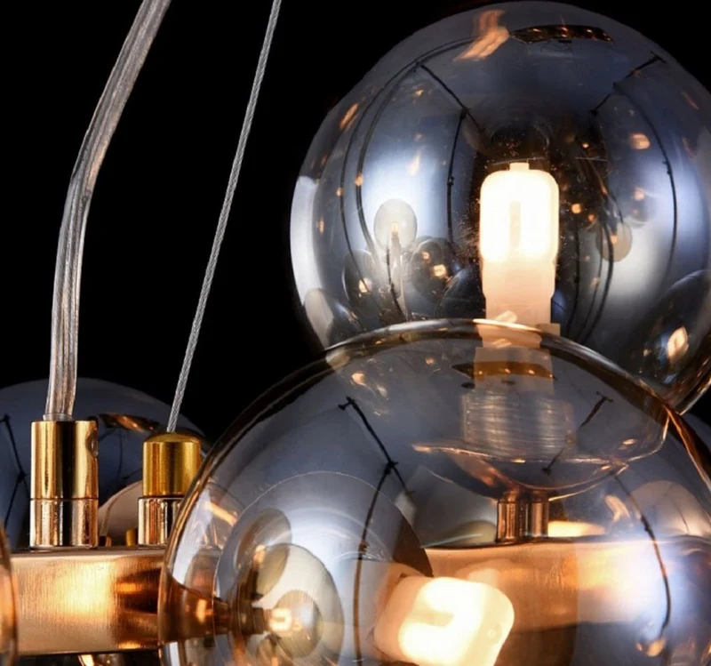 Casa Padrino Designer Hängeleuchte Gold 123,5 x 23,8 x H. 22,8 cm - Moderne Wohnzimmerlampe mit bernsteinfarbenem Glas