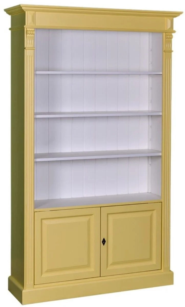Casa Padrino Landhausstil Bücherschrank in Gelb und Weiß, Massivholz, 119 x 39 x H. 197 cm