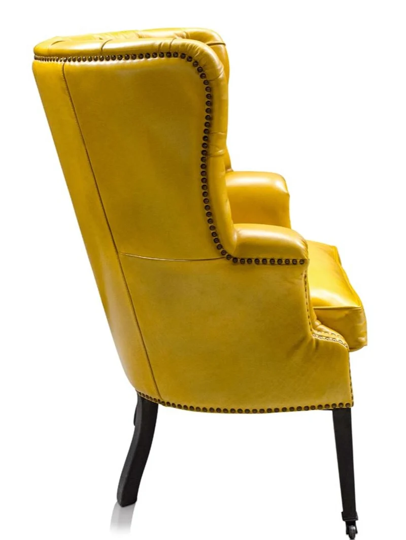 Casa Padrino Luxus Echtleder Sessel Gelb / Schwarz 84 x 85 x H. 112 cm - Luxus Hotel Möbel